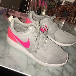 Grey and pink Nike shoes