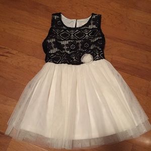 Sweet black lace and white tulle dress. Size 2.