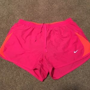 Pink and orange women's Nike shorts