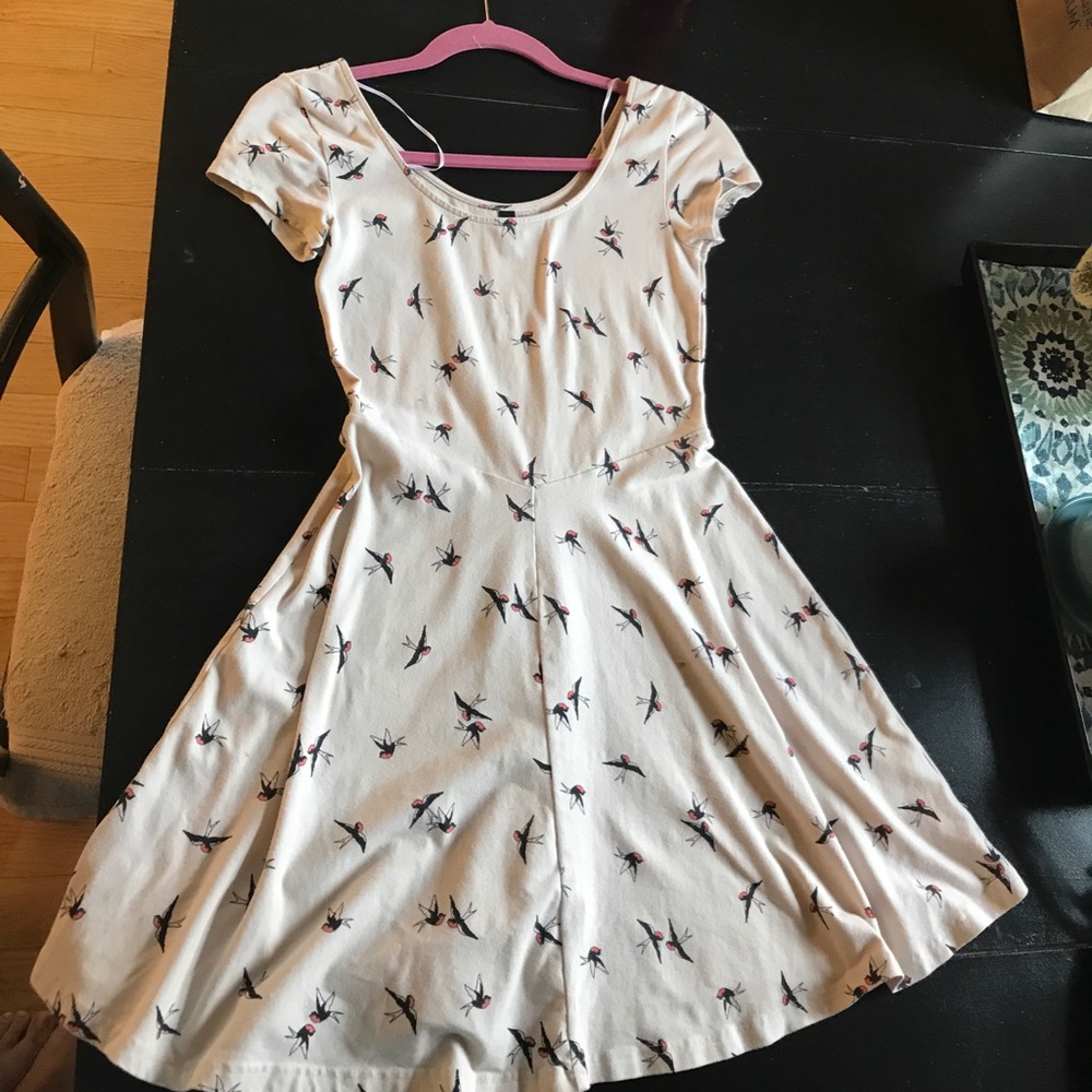 Small adorable dress with birds on it