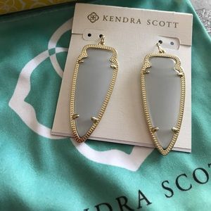 Kendra Scott Skylar gold earrings.