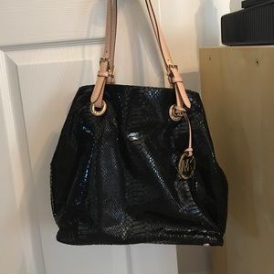 Black Michael Kors purse snake finish