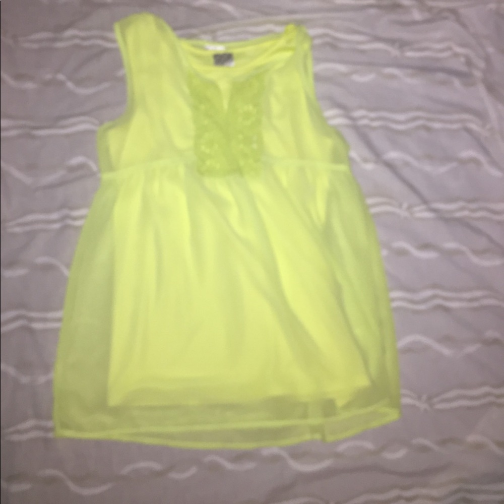 A yellow tank top