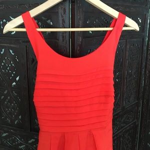 Eva Franco orange pleated dress