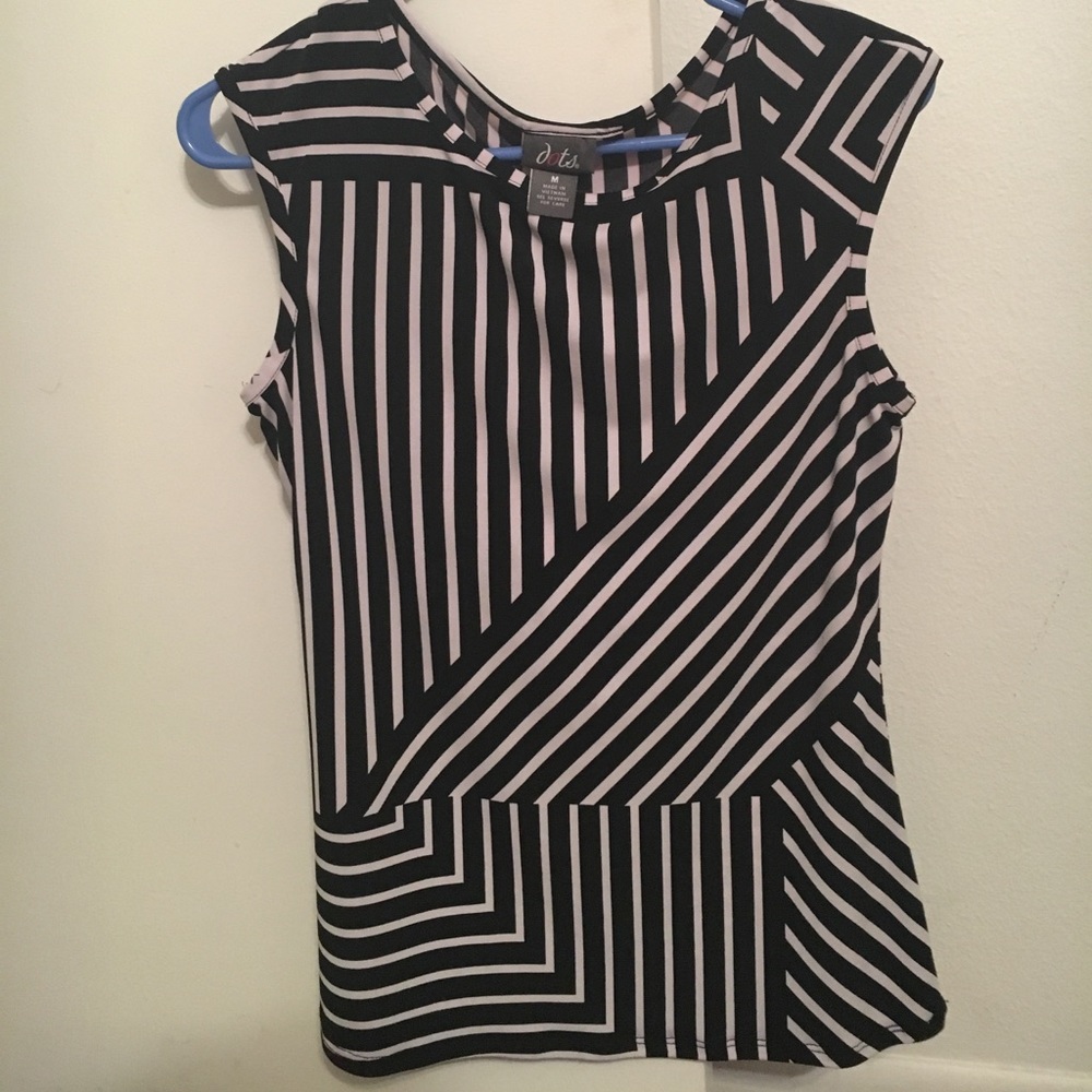 Sleeveless black and white shirt