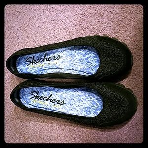 Skrechers slip on Black shoes