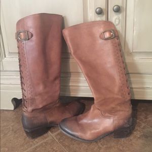 Brown knee-high boots w/ detail. Great condition.