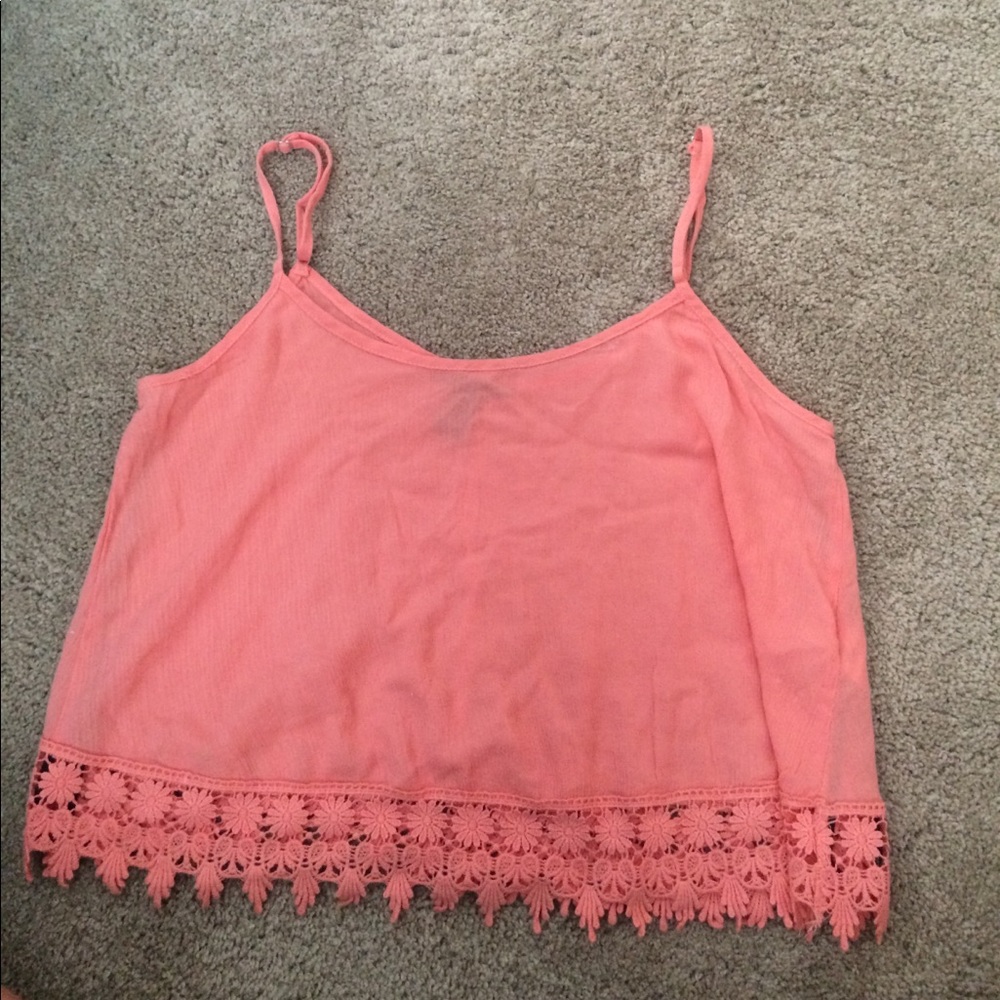 Coral tank top with lace hemming on bottom
