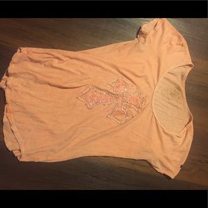 Velvet stone peach cross shirt.