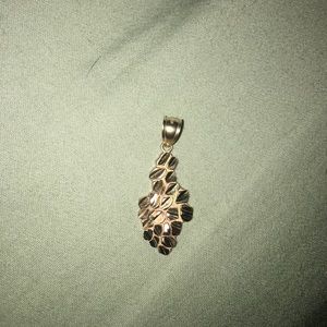 Solid 10kt gold nugget pendant 1 inch tall.