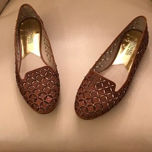 Michael Kors perforated leather flats.