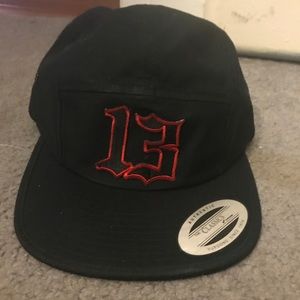 Black 5 panel skater hat with 13 patch