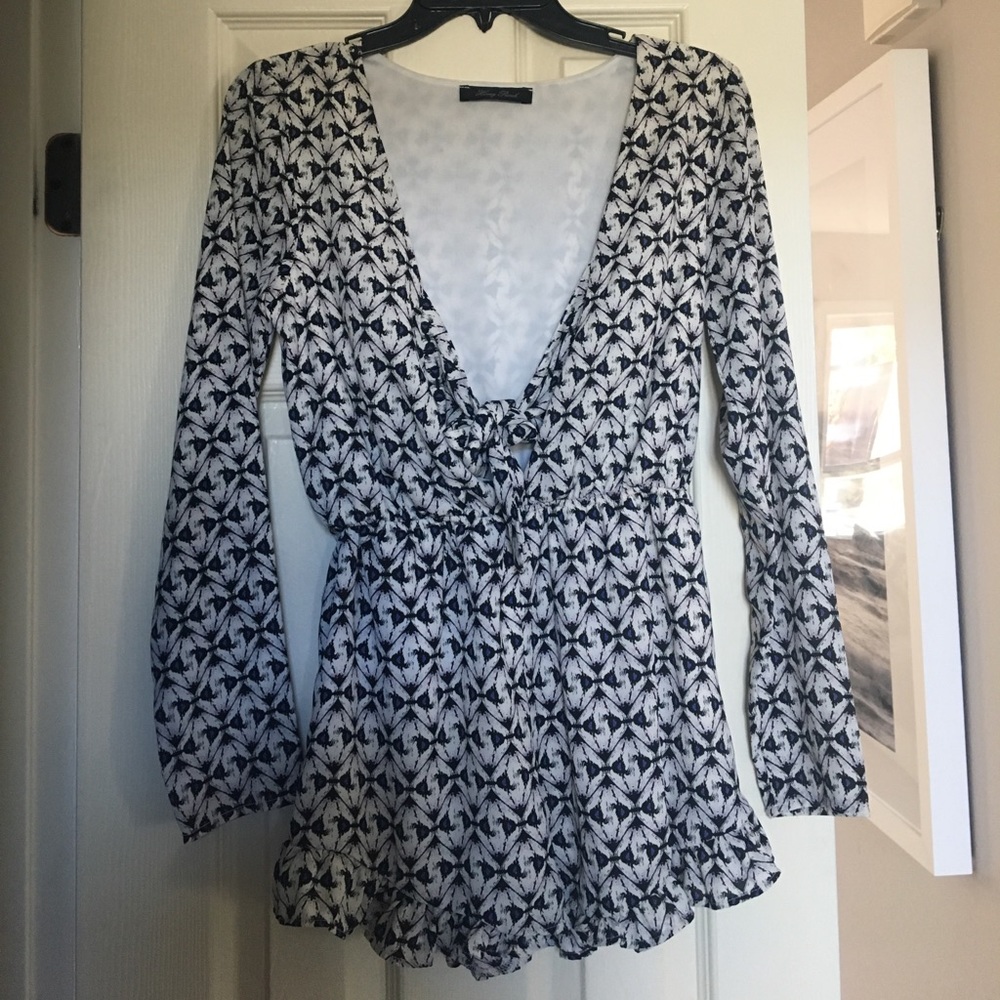 RARE: Purple and black printed romper!!