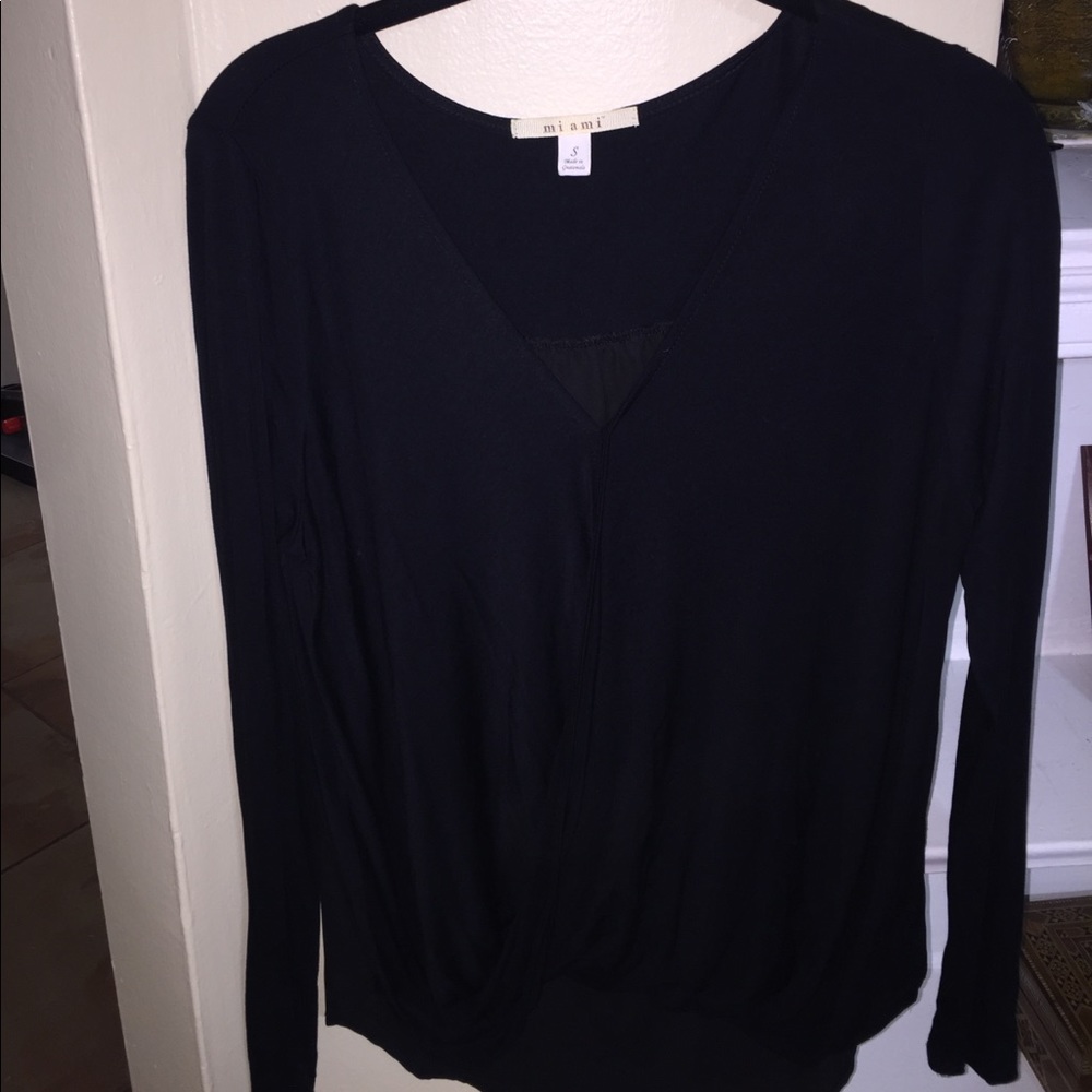 Wrap style top with a black sheer back