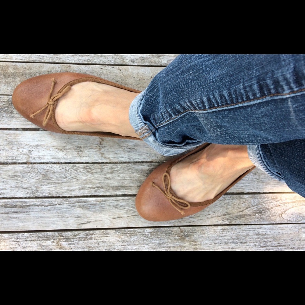 Cognac brown leather ballet flats.