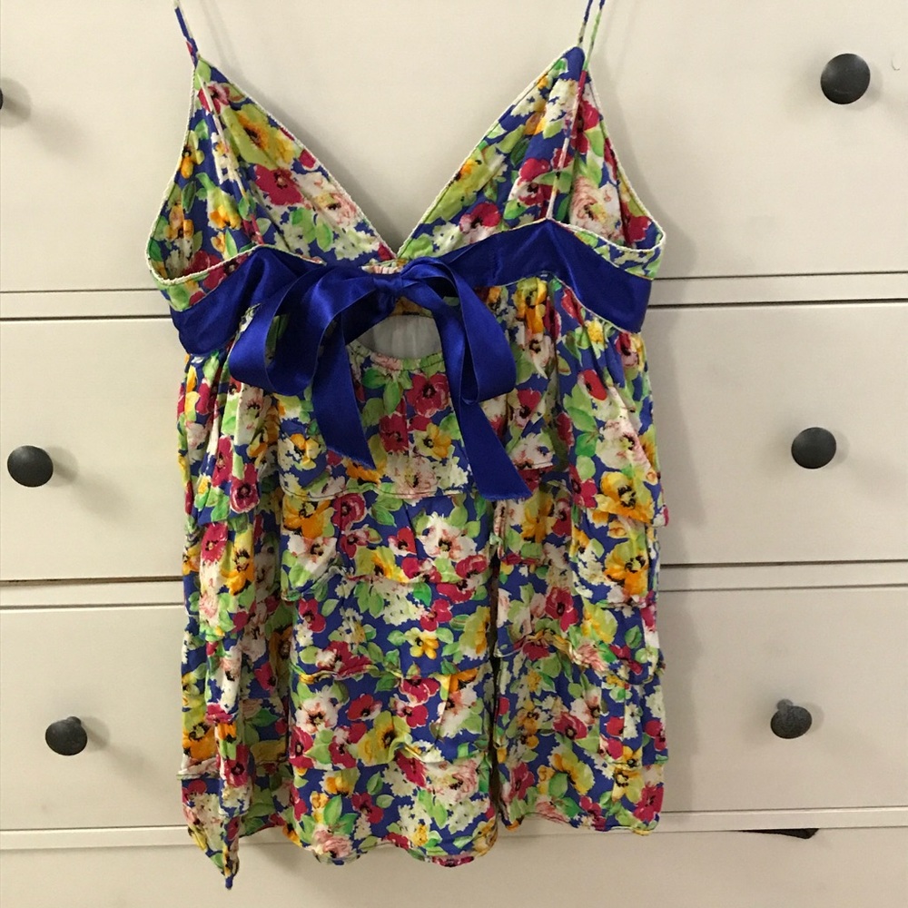 Cute baby doll dress with open back bow detail sml