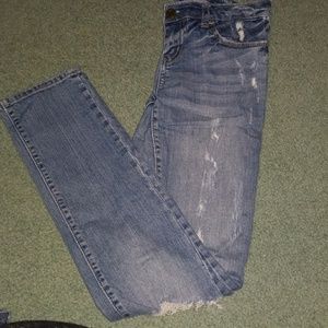 AE DISTRESSED LIGHT SKINNY JEANS