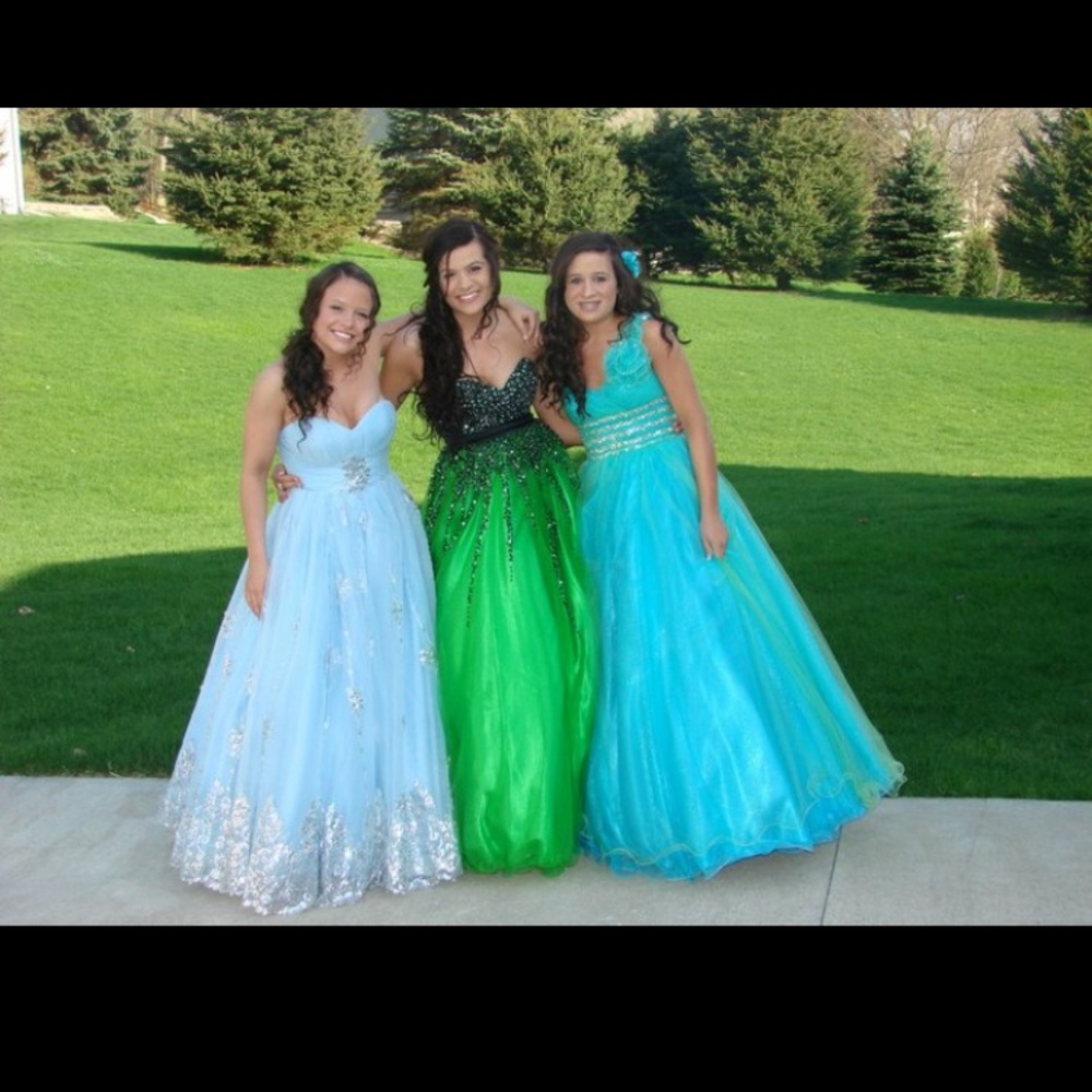 Bluish green prom dress from Charlotte's Bridal!