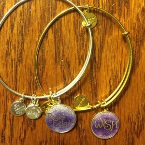 Alex and Ani "Wish" and "Peace & Love" bracelets.