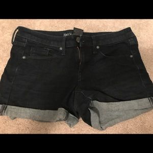 Dark denim shorts; size 0/25