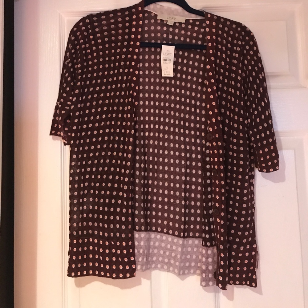 Short sleeve cardigan.