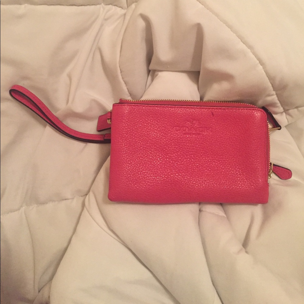 Hot pink Coach wristlet