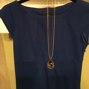 Royal blue dress 72% poly, 23% rayon, 5%spandex.