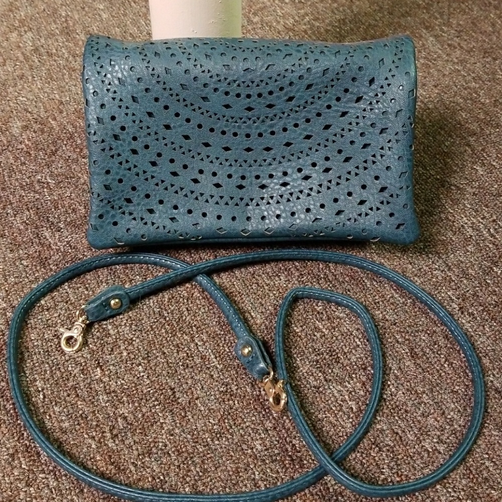 The perfect casual Crossbody OR clutch.