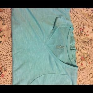 Work out shirt ....ties in back .. never worn