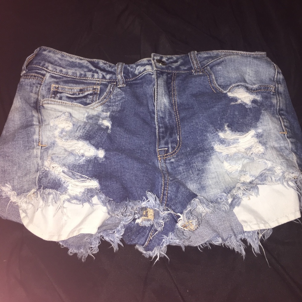 Medium wash ripped denim shorts