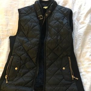 Black and gold vest