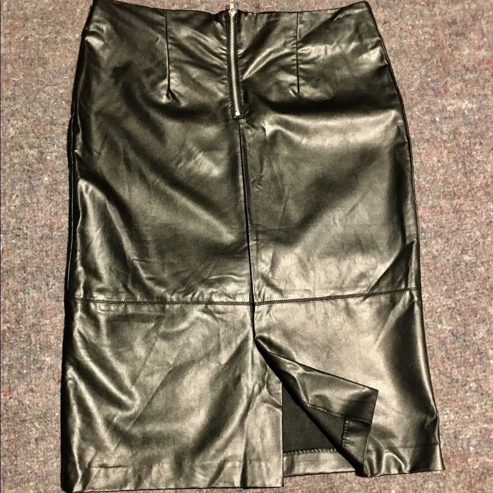 Knee length black faux leather skirt