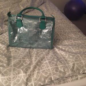 Christian Lacroix green bag.