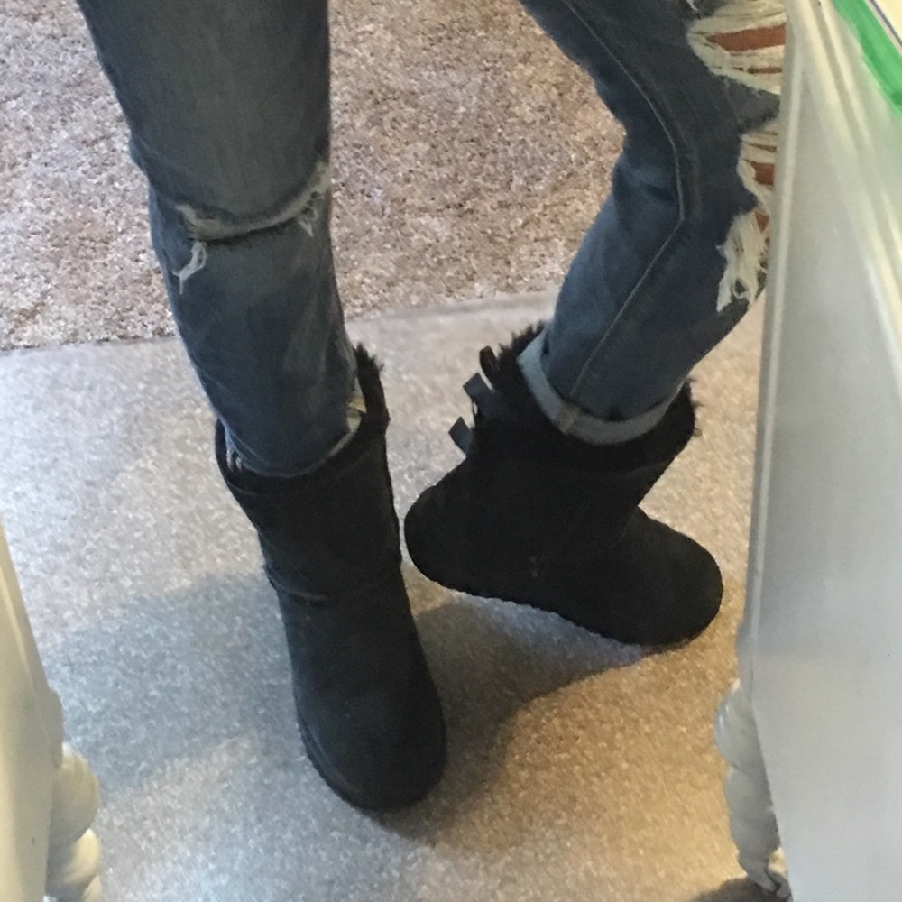 Black ugg boots with bows in the back