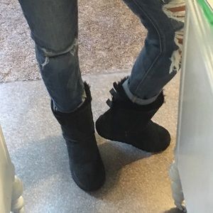Black ugg boots with bows in the back