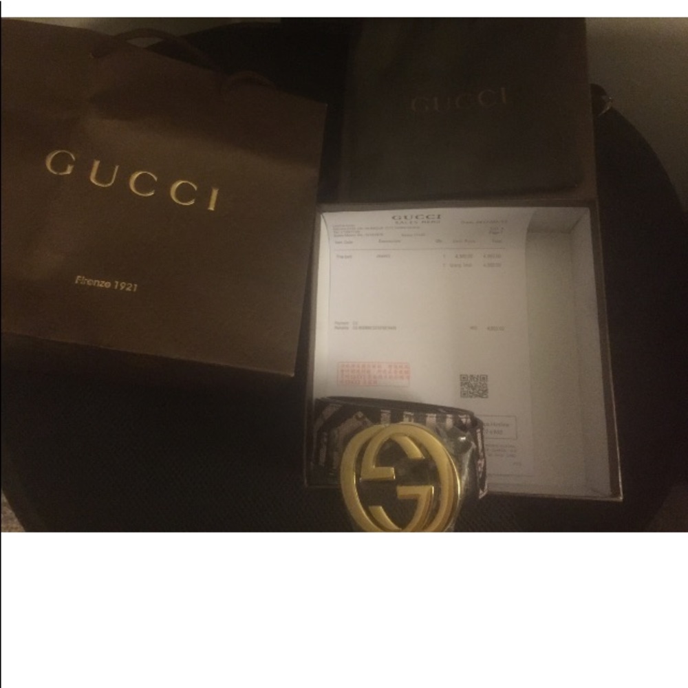 Gold buckle Gucci belt