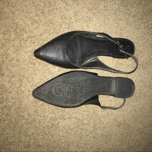 Black leather flats with back strap