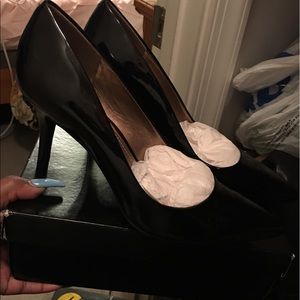 Black patent leather BCBG pumps