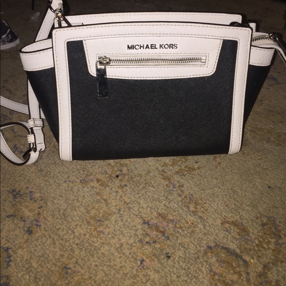 Micheal Khors black and white purse
