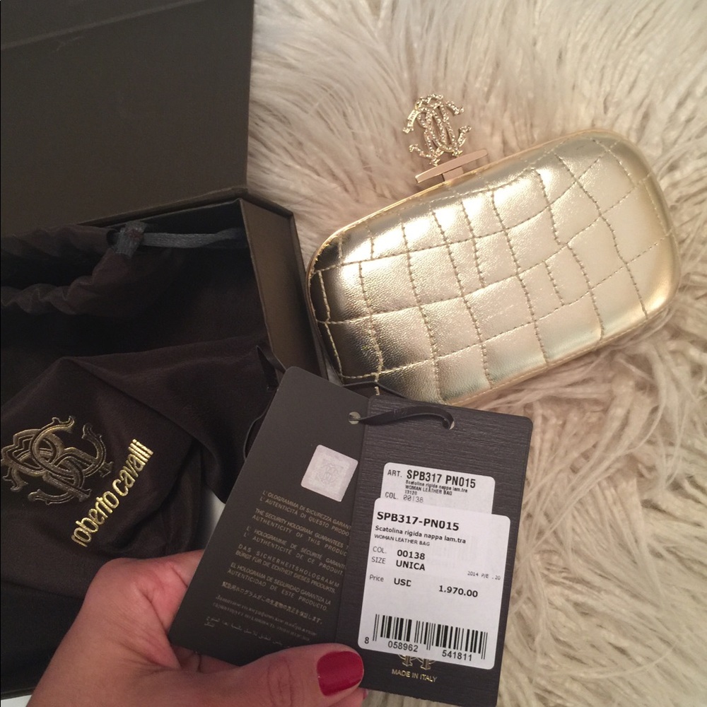 Leather in gold color purse! With tags and box!