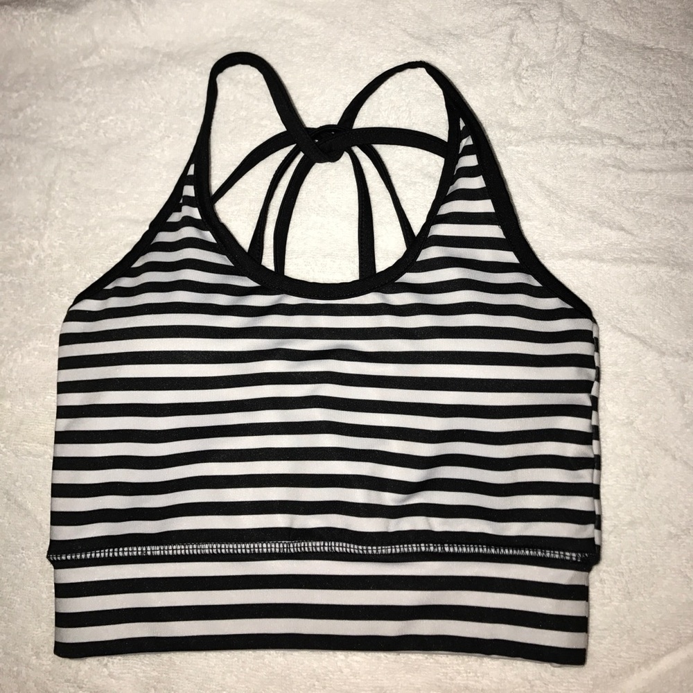 Long sports bra with black and white stripes