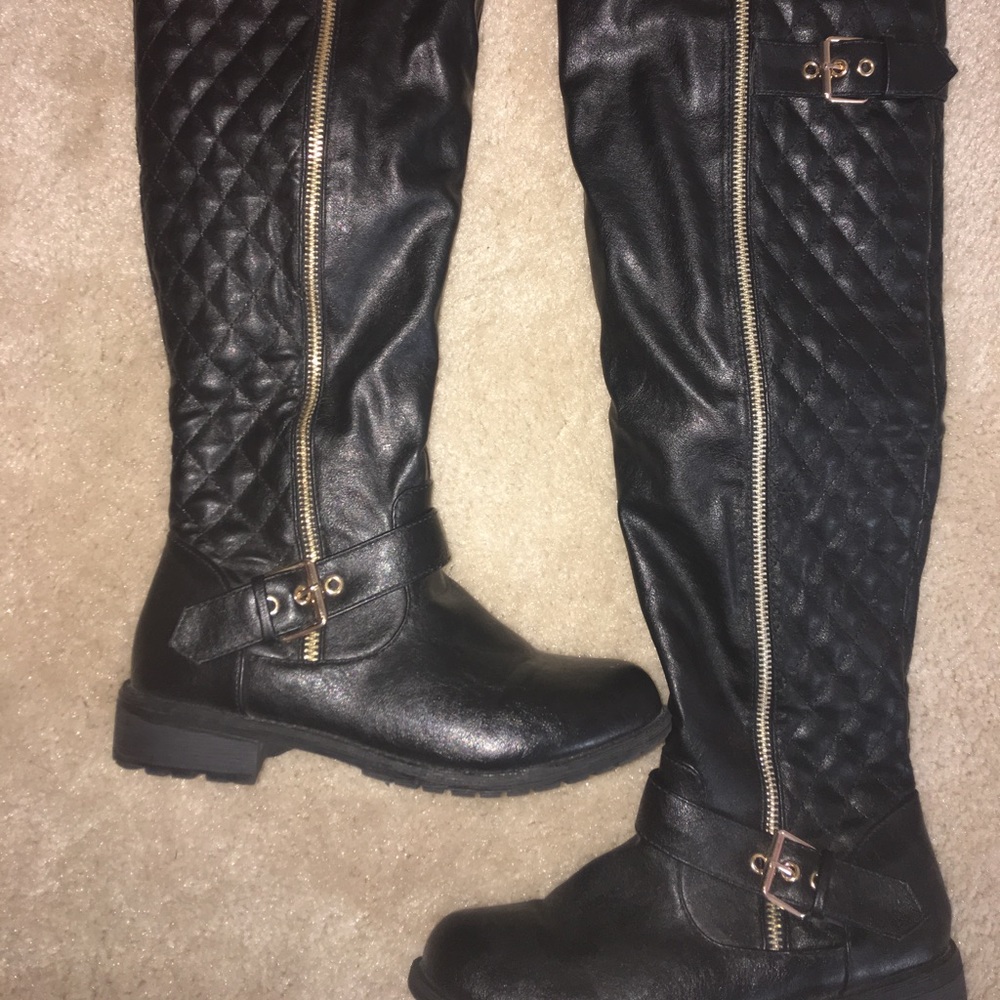 Tall black boots