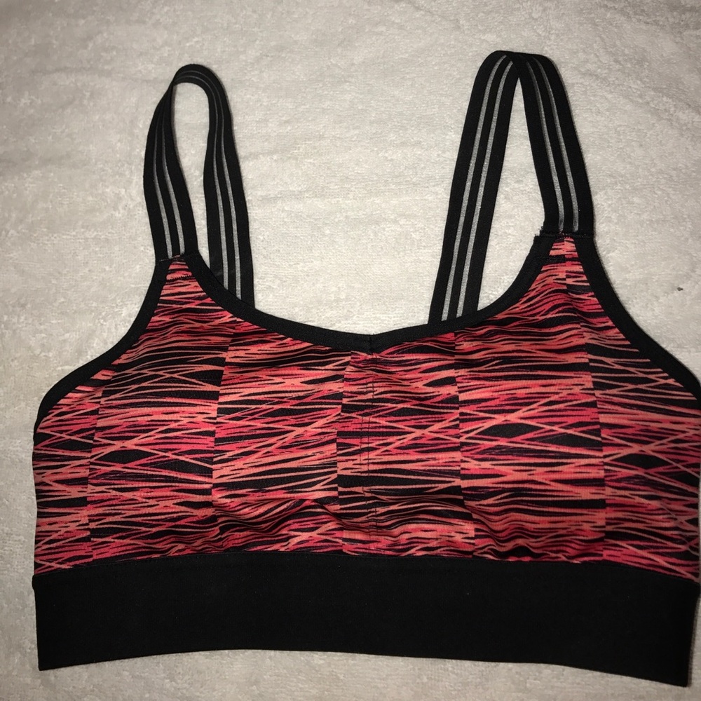 Red pink and orange sports bra with open back