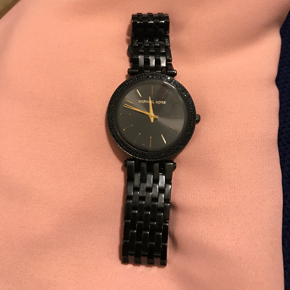 Black Michael Kors watch with gold accents!