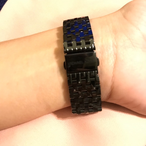 Black Michael Kors watch with gold accents!