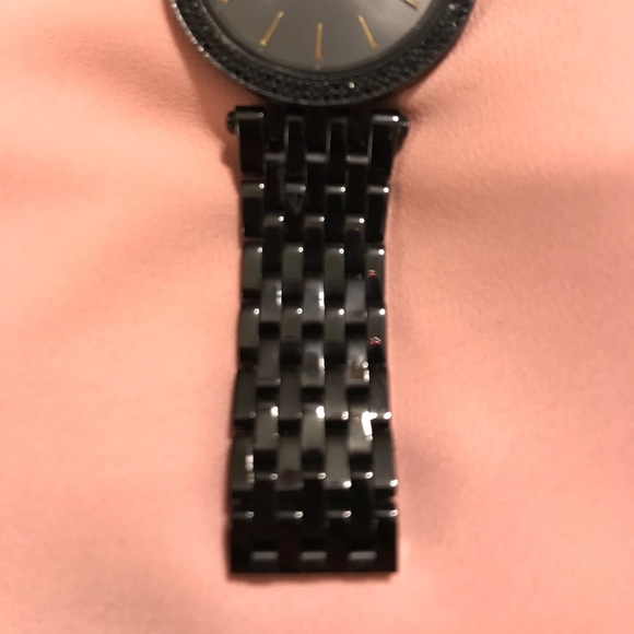 Black Michael Kors watch with gold accents!