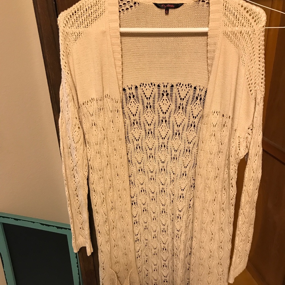 Cream knee length knitted cardigan