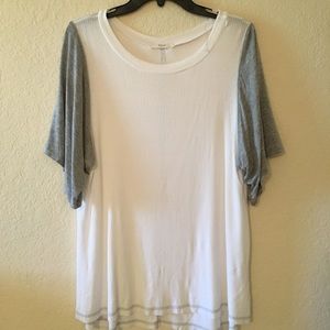 White top with grey sleeves