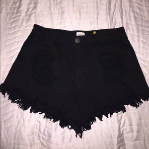 Black high waisted jean shorts w/fringe edge