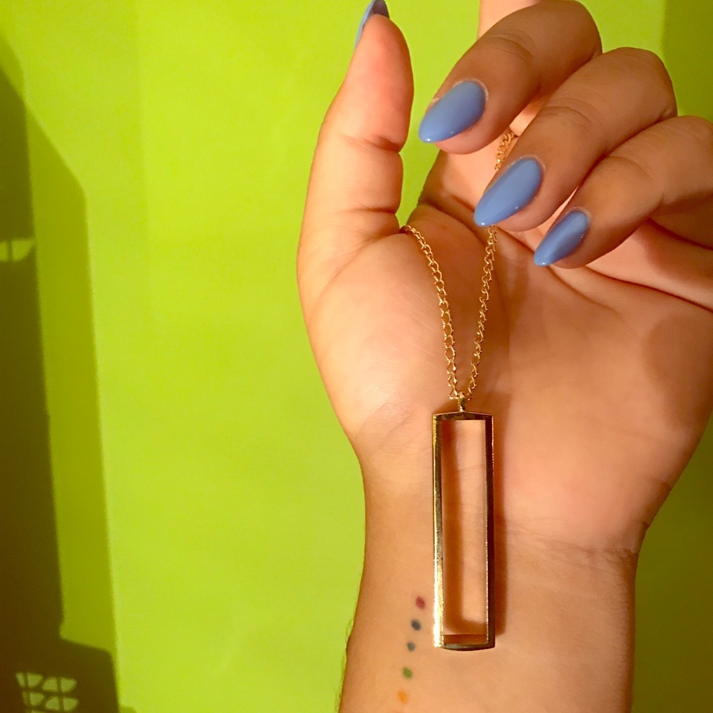 long, simple gold necklace